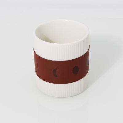 China Sustainable Ceramic Made Moon Phase Changing Slow Performance Ceramic Candle Jar for sale