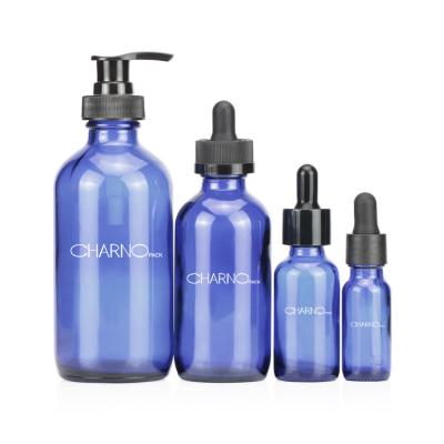 China Amber15ml 30ml 60ml 120ml Boston Glass Essential Oil Cosmetic High Grade Blue Empty Bottle With Tube for sale