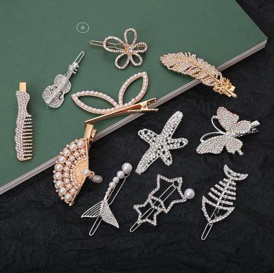 China Fashion Trendy Women Gold Diamond Hairpin Flower Clip Feather Alloy Full Edge Clip for sale