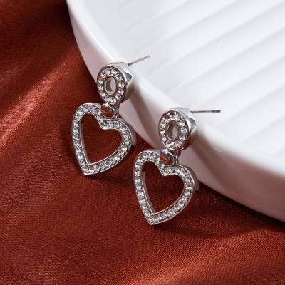 China China factory direct sale TRENDY alloy earrings hollow circle heart shaped earrings for sale