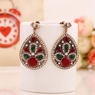 China FASHIONABLE Exaggerated Alloy Drop Shaped Inlaid Diamond Drop Resin Earrings Rhinestone Earrings for sale