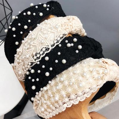 China New Sports Arrive Wholesale White Black Circle Star Flower Girls Lace Headbands Hair Women Bead Knot Hair Accessories for sale