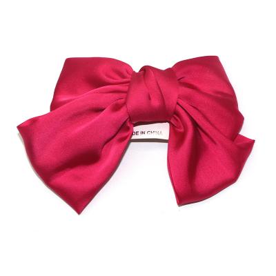 China Environmental Friendly Korean Style Latest Big Bow Hair Clips Satin Ribbon Fabric Butterfly Hair Clips For Girls Women for sale