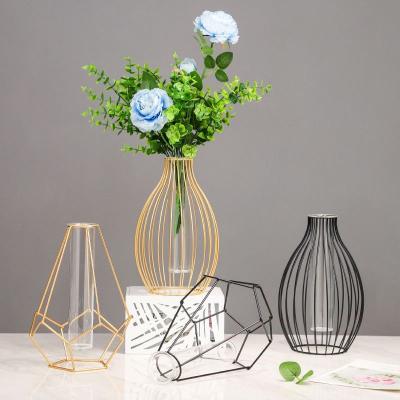 China Art Decor Home Pit Transparent Plant Flower Hydroponic Table Ornaments Glass Vase With Metal Stand For Home Decor for sale