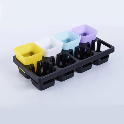 China Eco-friendly Black Plastic Flower Stand Wholesale 8 Cell Seedling Trays Plant Growing Rack for sale