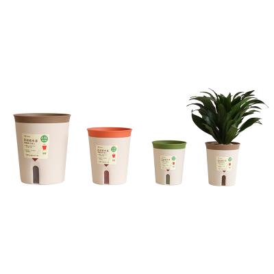 China Hot Eco-friendly Durable Amazon Turned Plant Plastic Pot Wholesale Self Watering Flower Pots for sale