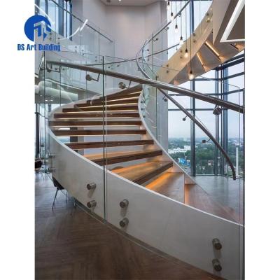 China Modern DS Customized Villa Luxury Glass Fencing Steel Plate Stringer Curved Staircase Floating Wood Double Tread Arch Staircase for sale