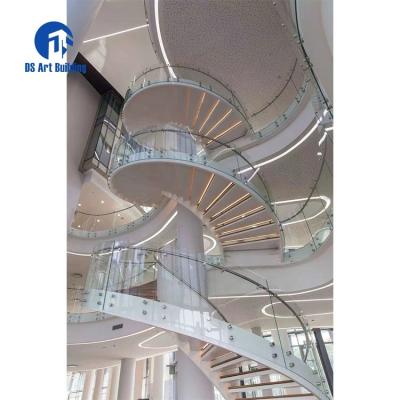 China Modern DS Customized Luxury Villa Glass Fencing Steel Plate Stringer Curved Staircase Floating Arc Double Staircase for sale