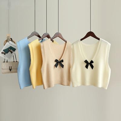 China 2021 Breathable V Neck Sleeveless Bow Vintage Solid Loose Knitted Thick Sweater Women Vest Girls Sweater Suits Female Vest Chic Tops for sale