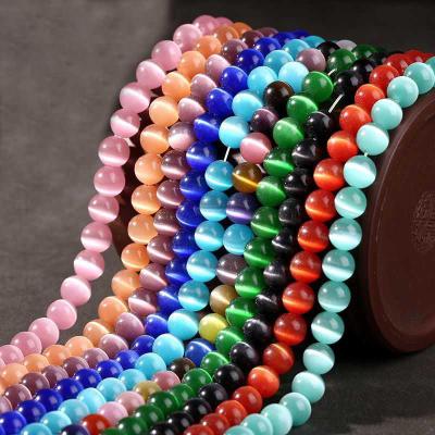 China Natural White Hing Quality Stone Gemstone Pink Cats Eye Cat Eye Beads Round Loose Stone Bracelet Jewelry 8 10 Beads 12mm Crystal for sale