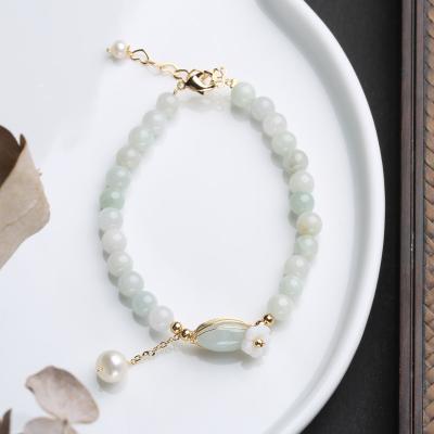 China Fashionable Natural Shell Flower Bead Jade Winding 14K Gold Pearl Bangle Natural Freshwater Tide Cold Wind Hand Luxury Jewelry for sale