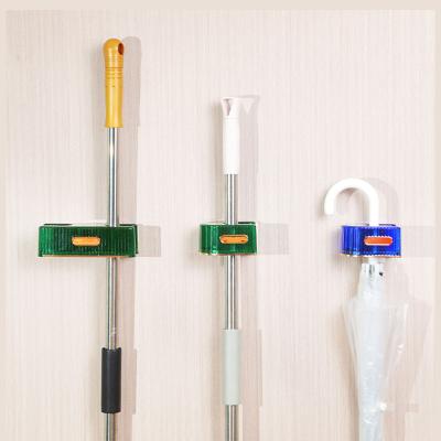 China New Adhesive Broom Broom Holder Wall Mounted Household Viable Storage Hanger Hook Racks Kitchen Bathroom Organizer for sale