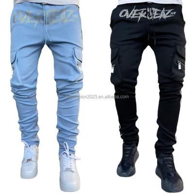 China Breathable Trendy rhinestone logo cargo pants men fashion zipper pockets slim fit joggers sports style men's pants trousers for sale