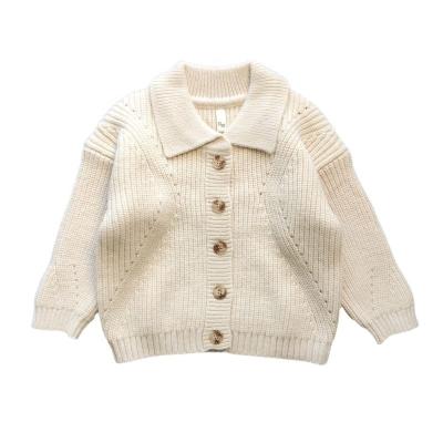 China Anti-pilling long sleeved children's sweater cardigan in the pure color of the lapel of the small children knit the boy and girl version Korean baby sweater for sale