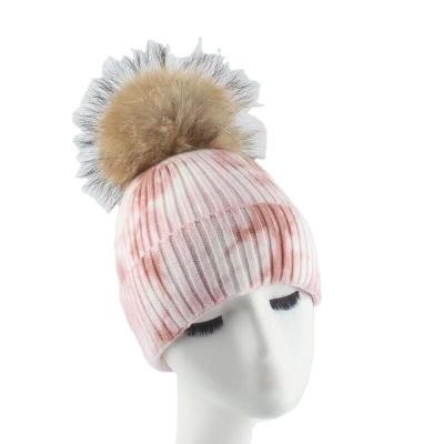 China Real Raccoon Fur Ball Hat Autumn And Winter Color COMMON High End Fur Ball New Wool Tie Dye Knitted Beanie Hat And Cap for sale