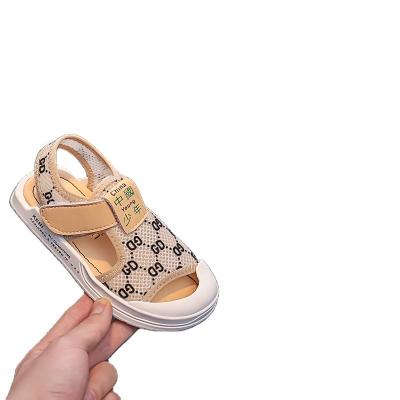 China Flat Boys Sports Sandal 2021 New Korean Edition Breathable Headband Anti-kick Sand Non-slip Shoes Printed GD Children's Shoes for sale