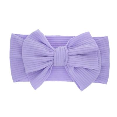 China Baby Soft Bow Headband Solid Color Girls Elastic Headbands Softly Barrels Bow Hair Band for sale