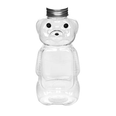 China Hot Sales 500ml Disposable Plastic Beverage Bear Bottle With Cap for sale