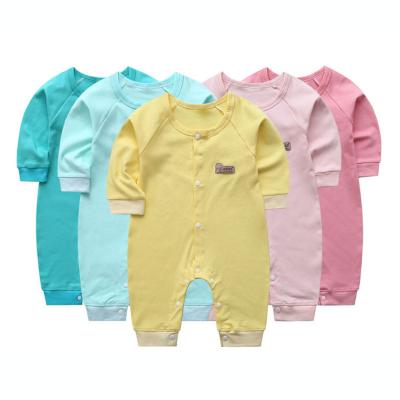 China 2022 Newborn Baby Rompers Baby Clothes Long Sleeve Baby Jumpsuits Plain Color Newborn Baby Rompers High Quality Sleep And Play for sale