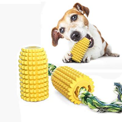 China Stocked Dog Toothbrush Chew Toy Corn Molar Stick Dog Toy Bite-Resistant With Rope Puzzle Dog Pet Tooth Toy for sale