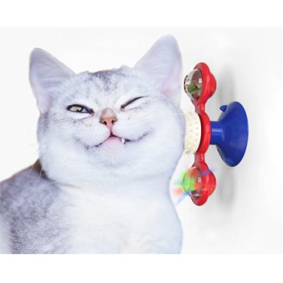 China Massage Scratcher Tickling Toothbrush Stocked Cleaning Tower Around Windmill Cat Toy Turntable Lighter Scratching Cat Itchy Toys for sale