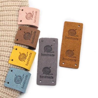 China Viable Sew Opens 2*5CM Hand Made Tags Knitting Yarn Leather Label Handmade Hat Tags Ball For Clothes for sale