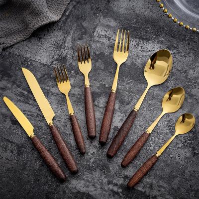 China Sustainable Golden Stainless Steel Spoon, Fork, Wooden Handle Flatware Set Knife for sale