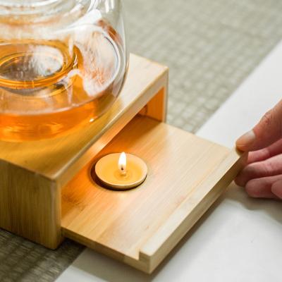 China Sustainable Teapot Wood Bottom Candle Tea Ceramic Water Insulation Tools for sale