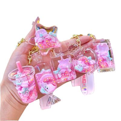 China Cute Ring Creative Filled Liquid Oil New Souvenir Quicksand Bag Dangling Donuts Floating Liquid Key Chain for sale