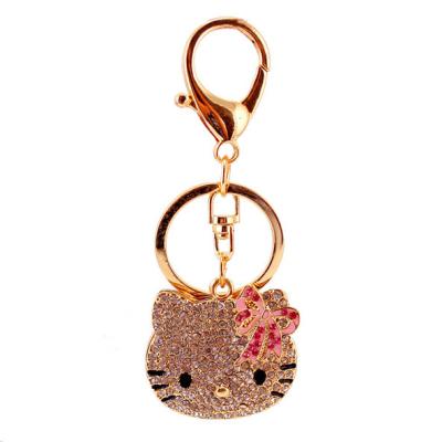 China Enamel KT Cat Keychain Fashion Rhinestone Elegant Kitty Rhinestone Cosmetic Mirror Decoration Keychain for sale