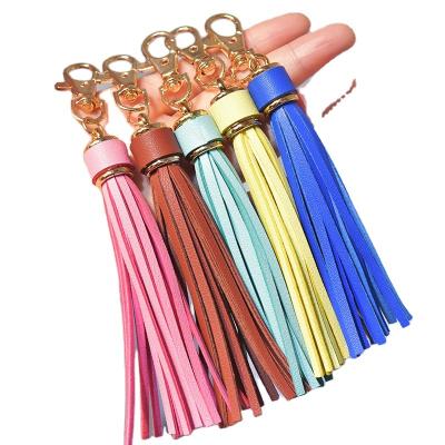 China New Fasion Style Different Color PU Tassel Diy Key Chain Bag Common Leather Accessories Tassel Bag Key Chain Accessories for sale