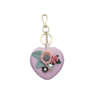 China Cute Creative Heart-Shaped Flower Folding Mirror Pendant Makeup Mirror Keychain Key Chain Small for sale