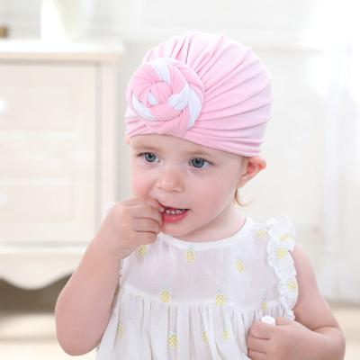 China Fashionable cute snail knotted mom children hair hood baby hats parent-child hats and baby hatsMulti-color picture children's hats for sale