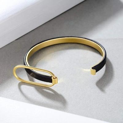 China Ouj FASHIONABLE with Lock Plated Gold Stainless Steel Minimalist Bracelets 18k Genuine Women Bracelet Bangle Leather Bracelet for sale