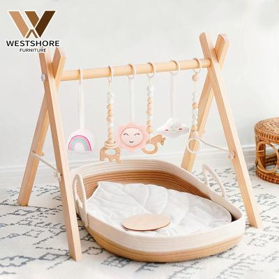 China Eco-friendly.anti-slip.water-proof baby gym play activity baby gym wood toys activity hanging fitness frame wooden toys with hanging hook hanging dolls for sale