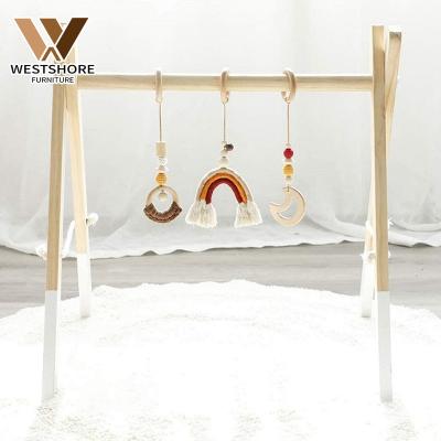 China Eco-friendly.anti-slip.water-proof wooden foldable play center frame funny baby activity baby play gym baby hanging wooden gym for sale