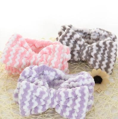 China Cute Compressed Bowknot Makeup Headband Style Coral Fleece Striped Cosmetic Headbands For Face Wash Shower for sale