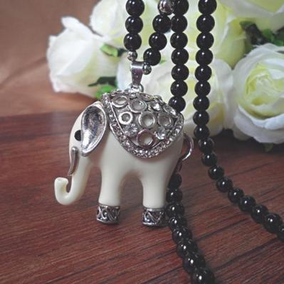 China ALLOY fashion redundant ivory pendant necklace, retro silver black pearl chain necklace for sale