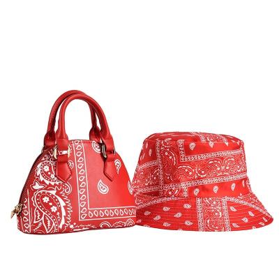 China Waterproof Cashew Flower Bucket Purse and Hats Set Luxury Women Handbags Handbags for Women Printed Fisherman Hat and Handbags for sale