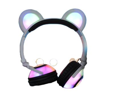 China New Design Bear Cartoon Headband Luminescent Foldable Headphones Earmuffs For Kids for sale