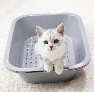 China Travel Cat Toilet Three-Layer Grid Easy To Clean Cat Bedpan Self Cleaning Plastic Top Quality Cat Litter Box Anti Splatter for sale