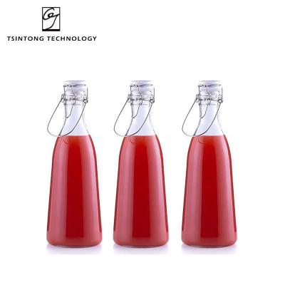 China Wholesale 500ml 1000ml Retro Luxury Modern Round Clear Milk Juice Beverage Drink Glass Bottle With Classic Swing Top for sale