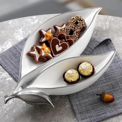 China Nordic Viable Porcelain Leaf Shape Plates Fruit Candy And Snack Tray Designed Unique Silver Rim Ceramic Dish Dish Craft for sale