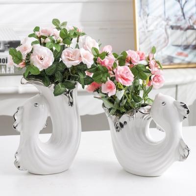 China Hot Selling Creative Minimalist Fish Shapes Vases Flower Water Handmade Vases Europe White Ceramic Modern Style Vases For Living Home for sale