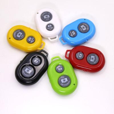 China Durable Wholesale New Innovations Remote Control Electric Shock to Mobile Phone Shutter Camera Remote Cell Phone for sale