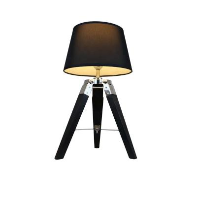 China Modern decorative bedside table lamp with wooden tripod base in black for sale