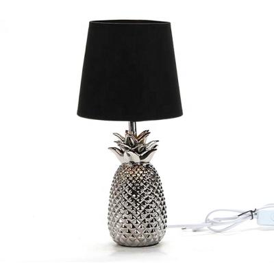 China Modern Home Decorative Black T/C Fabric Shade Table Lamp With Ceramic Pineapple Base for sale