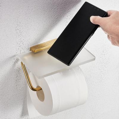 China Modern Golden Wall Mounted Tissue Roll Holder Towel Rack With Cell Phone Shelf Bathroom Glass Paper Holder for sale