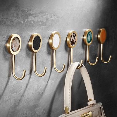 China Nordic Wholesale Modern Punch Free Shell Clothes Hook Bathroom Wall Hook Long Robe Brass Hooks for sale