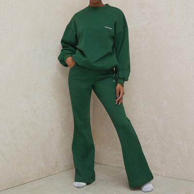 China Breathable Custom Green Flared Leg Track Jogger Woman Stacked Pants Two Piece Set for sale